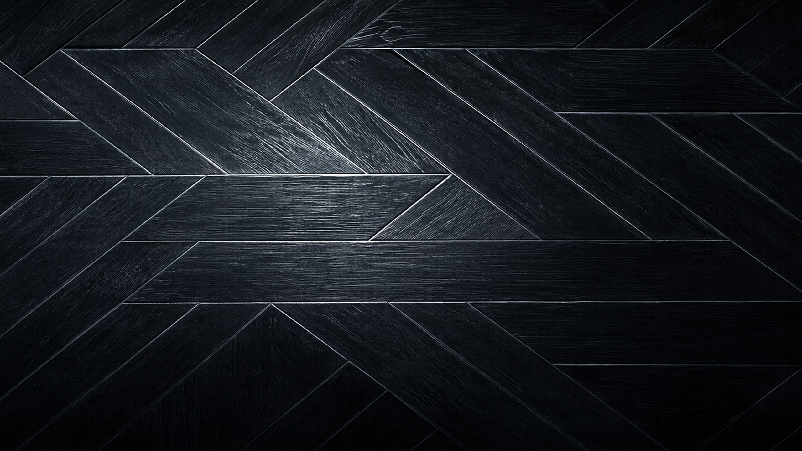 Preview of the Black Herringbone Wood desktop background at 2560 by 1440
